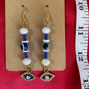 Mixed media evil eye dangle earrings
